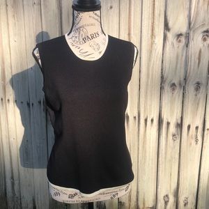 Black sleeveless top with white edges